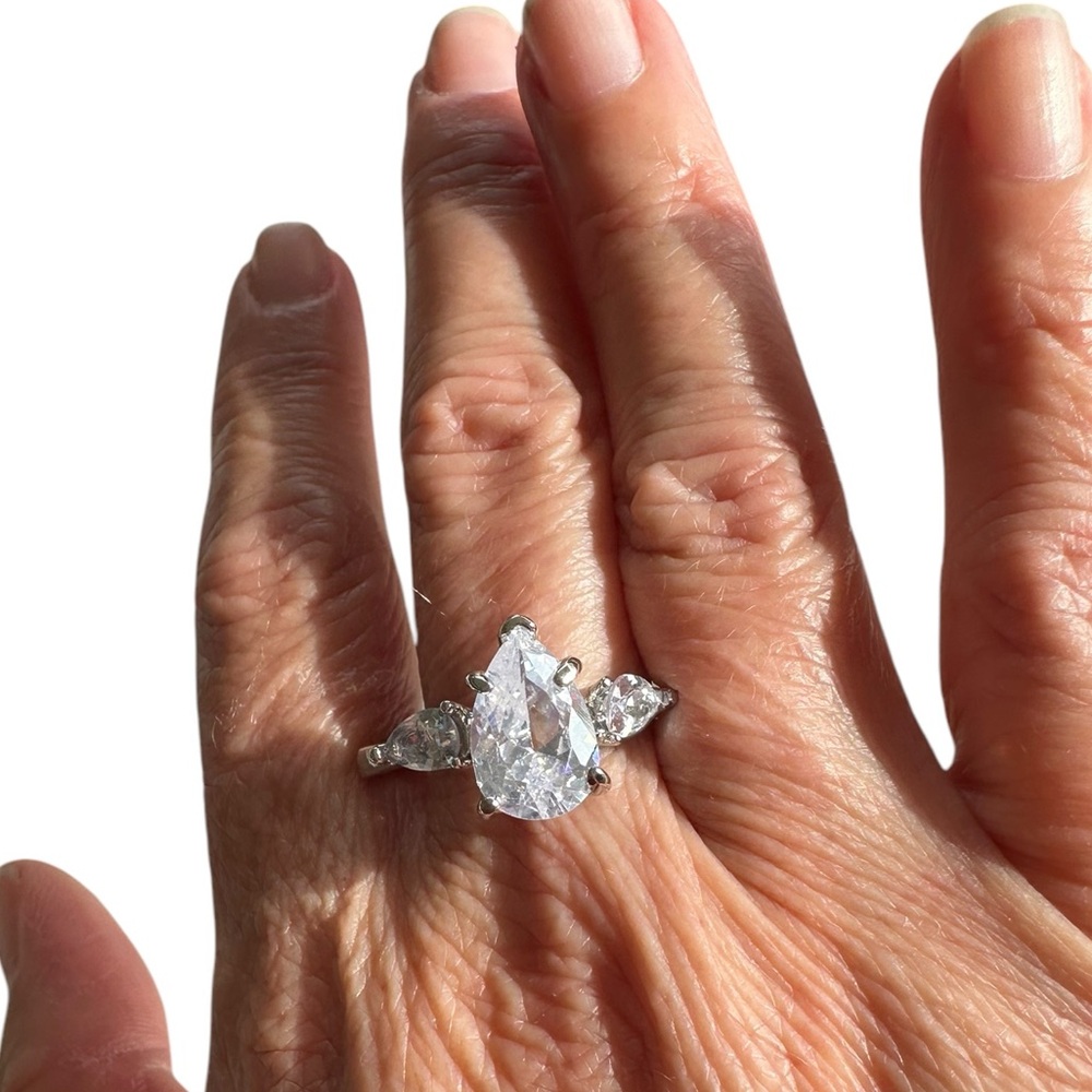 Pear Shaped Diamond and Silver Ring
